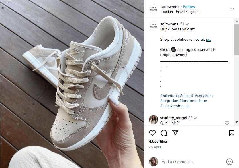 Instagram post with beige Nike sneakers in user's hand